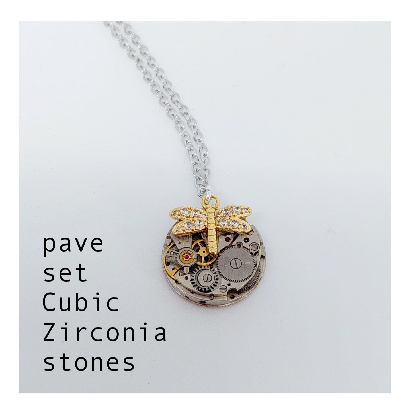 Mini timepiece pendant with sparkling dragonfly