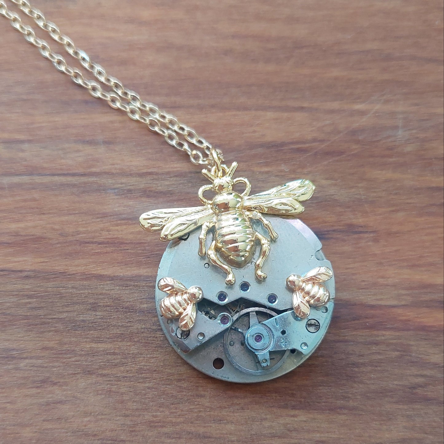 NEW!! Timepiece Pendant with Trio of Bees