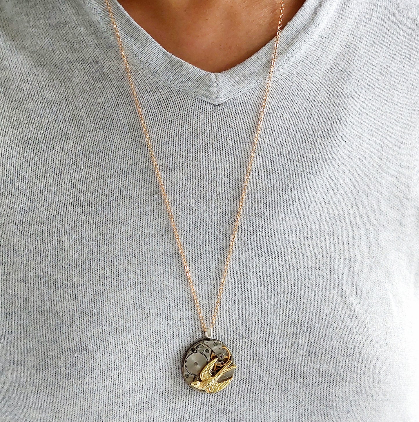 Timepiece Pendant with Golden Swallow