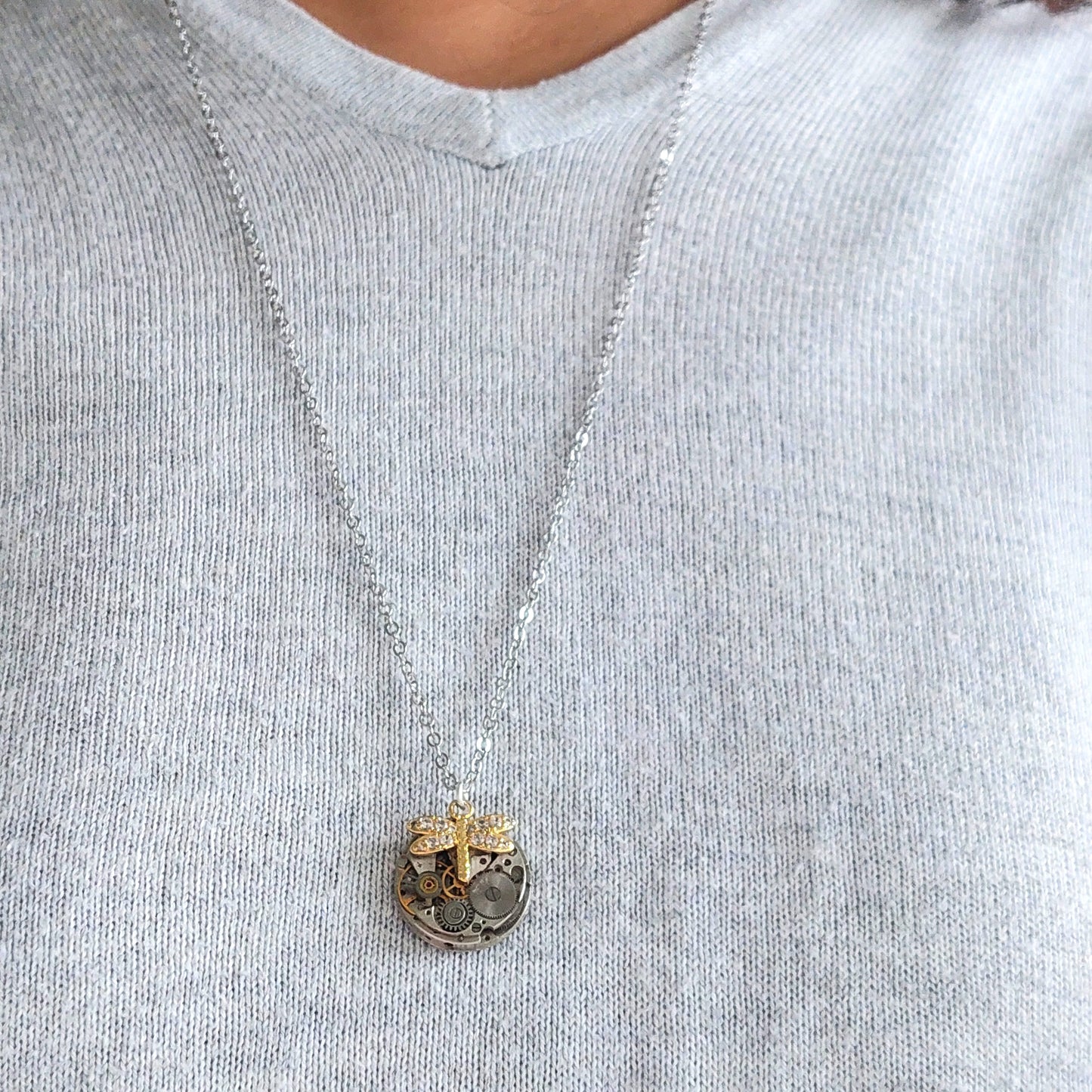 Mini timepiece pendant with sparkling dragonfly