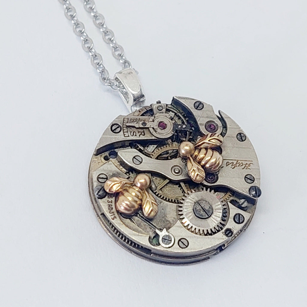 NEW!! Small timepiece pendant with tiny golden bees