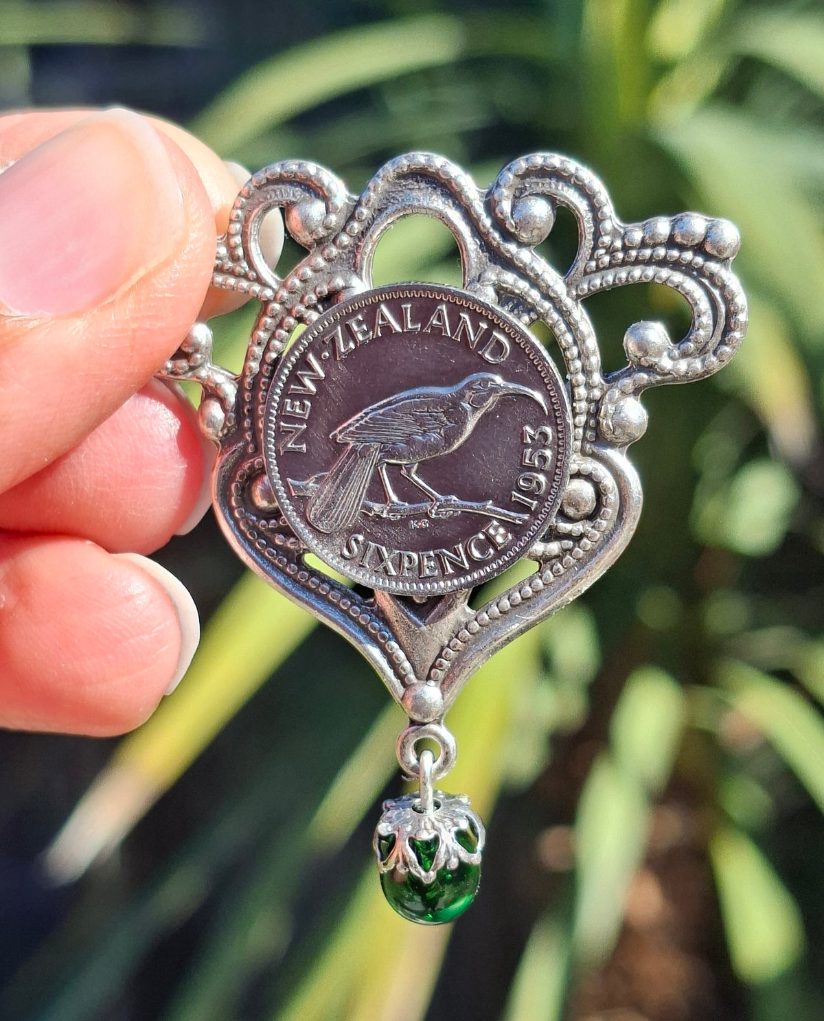 NEW! Re-minted Awa Flourish Brooch with Green Glass Drop