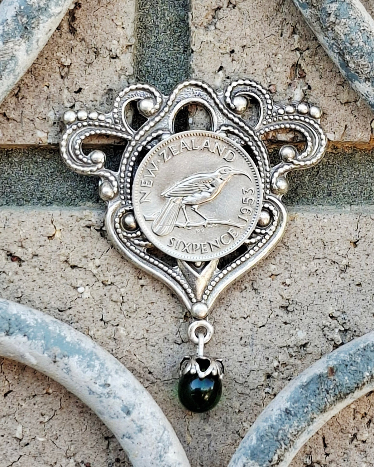 NEW! Re-minted Awa Flourish Brooch with Green Glass Drop