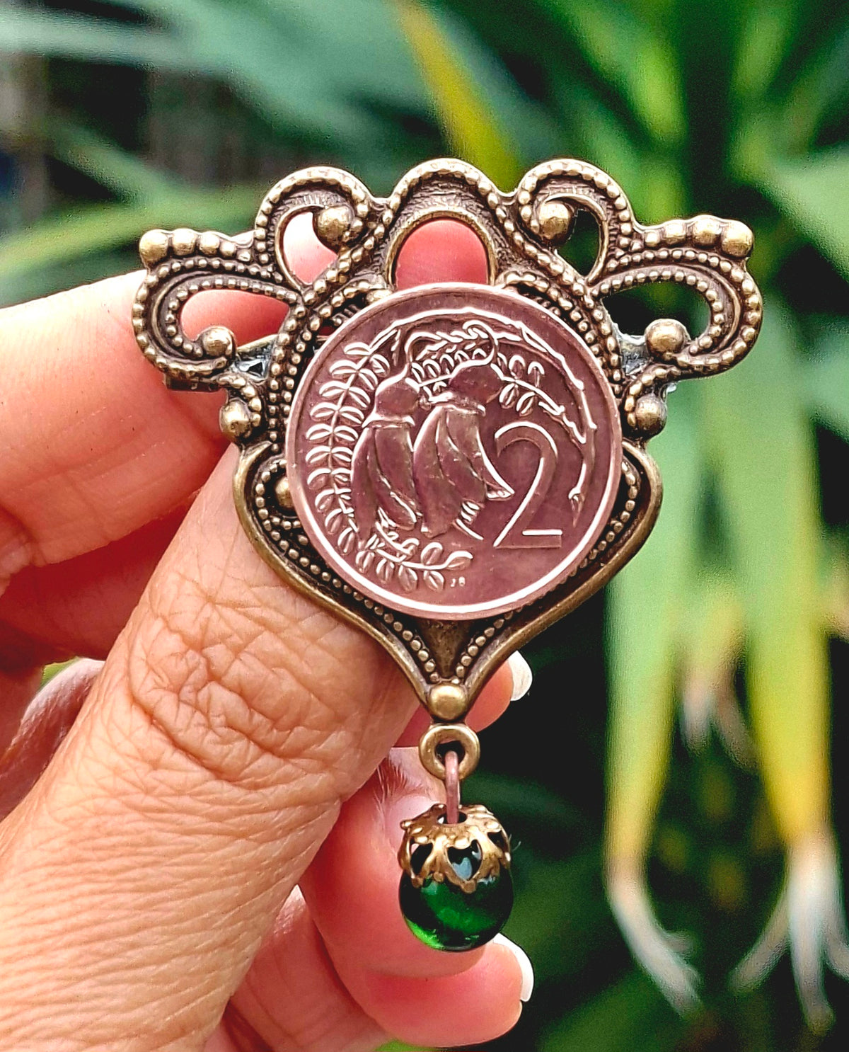 NEW! Re-minted Awa Brass Flourish Brooch with Green Glass Drop