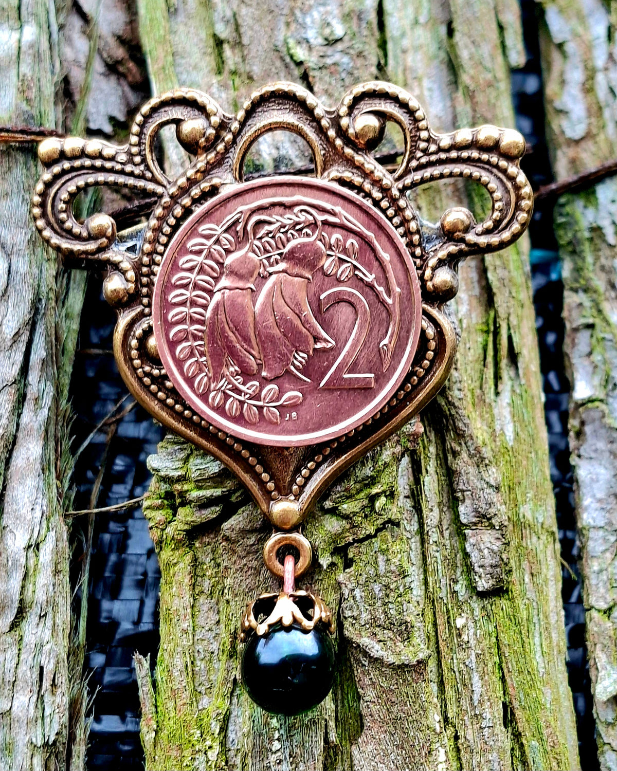 NEW! Re-minted Awa Brass Flourish Brooch with Green Glass Drop