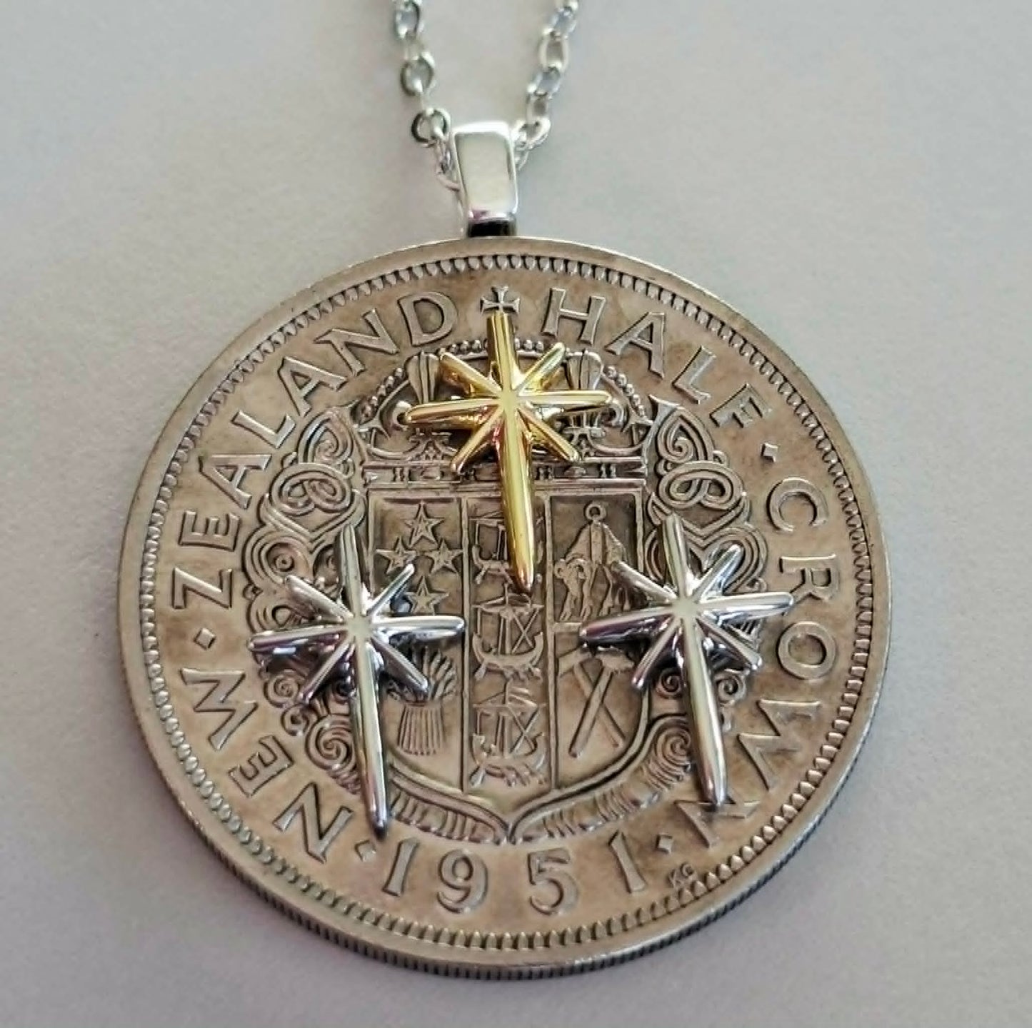 NEW! Matariki collection - Re-minted Half crown pendant with mixed metal stars