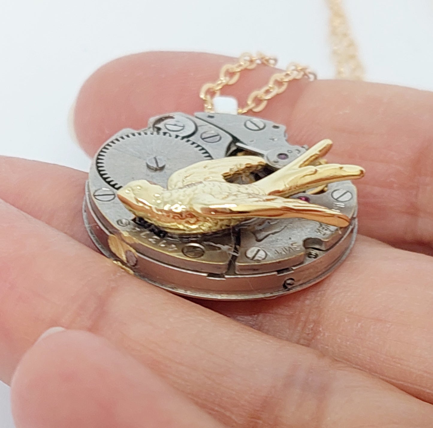 NEW!! Timepiece Pendant with Golden Swallow